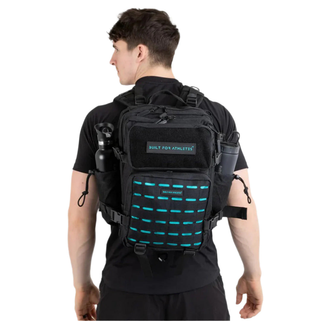 Built-for-Athletes-Hero-3.0-Backpack-aqua-blue-available-at-thepace-back-view-worn-on-male