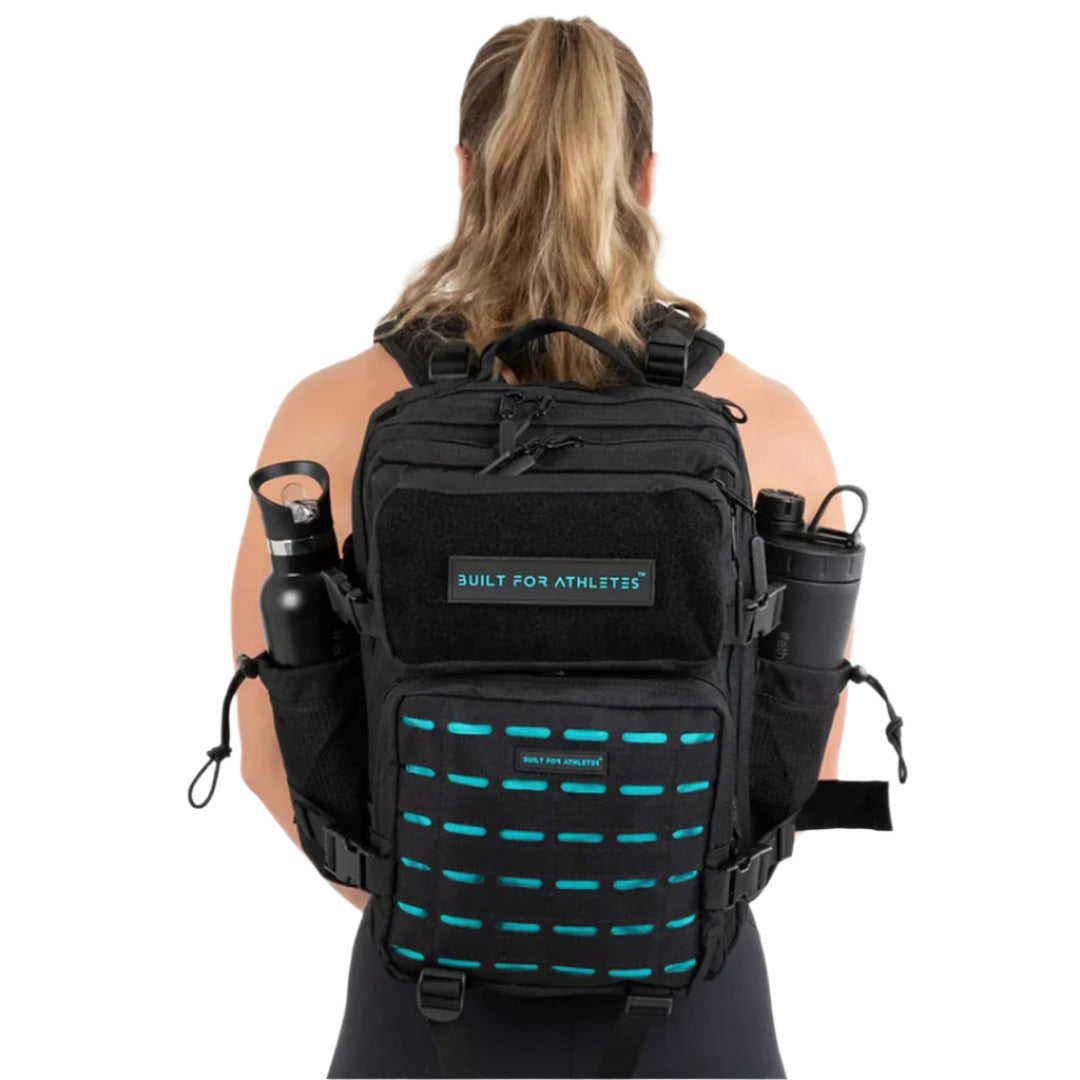Built-for-Athletes-Hero-3.0-Backpack-aqua-blue-available-at-thepace-back-view-worn-on-female